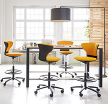 fauteuils orange haut ergonomique de bureau à roulettes avec repose pied