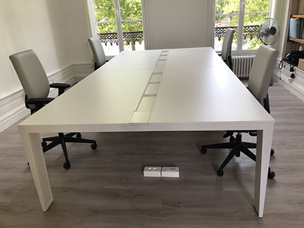 Grande table ou bureau de travail pour quatre personnes, une réalisation Riguet Bureautique